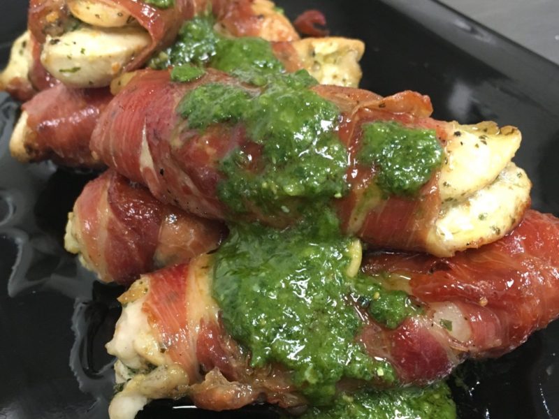 Chicken wrapped in Parma Ham topped with Pesto